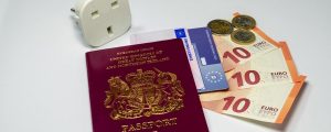 euro pass reseadapter panorama 300x120 - Uk Passport European Insurance Card And Euros With Travel Plug Adapter And Euro Currency